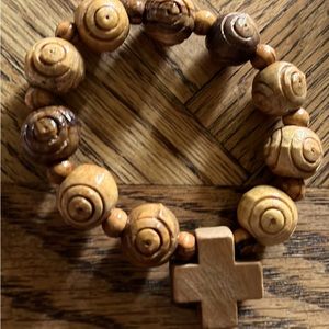 An olive wood bracelet with cross hand made in Bethlehem